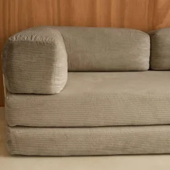 Divano letto futon in velluto a coste e struttura cromata