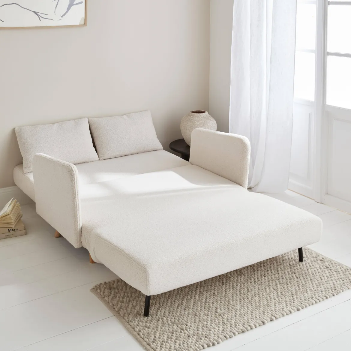 Divano letto in bouclé con gambe in legno, 2 posti
