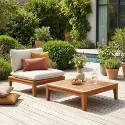 Divano modulare da giardino con tavolino in legno di acacia e bouclé, 1 posto