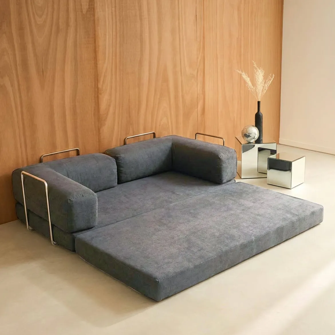 Divano letto futon in velluto a coste e struttura cromata