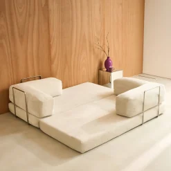 Divano letto futon in velluto a coste e struttura cromata