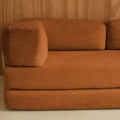 Divano letto futon in velluto a coste e struttura cromata