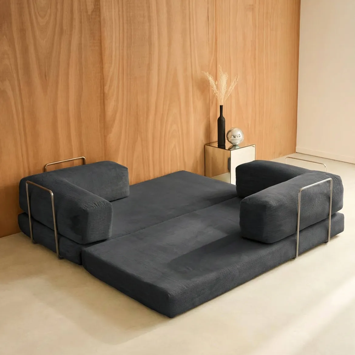 Divano letto futon in velluto a coste e struttura cromata