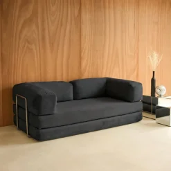 Divano letto futon in velluto a coste e struttura cromata
