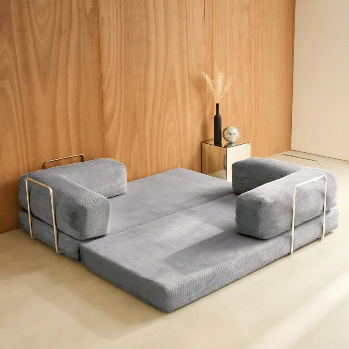 Divano letto futon in velluto a coste e struttura cromata
