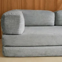 Divano letto futon in velluto a coste e struttura cromata