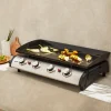 Piastra plancha a gas a 4 bruciatori con utensili