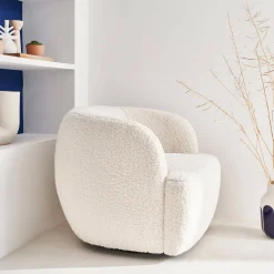 Poltrona girevole 360º in metallo e bouclé