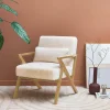 Poltrona scandinava in legno di hevea e tessuto effetto pelliccia sintetica