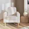Poltrona scandinava in legno e tessuto bouclè