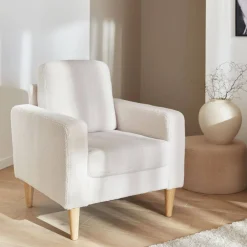 Poltrona scandinava in legno e tessuto bouclè