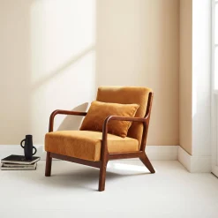 Poltrona scandinava in velluto a coste e legno di hevea