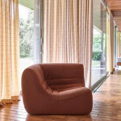 Poltrona angolare in bouclé testurizzato