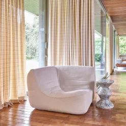 Poltrona angolare in bouclé testurizzato