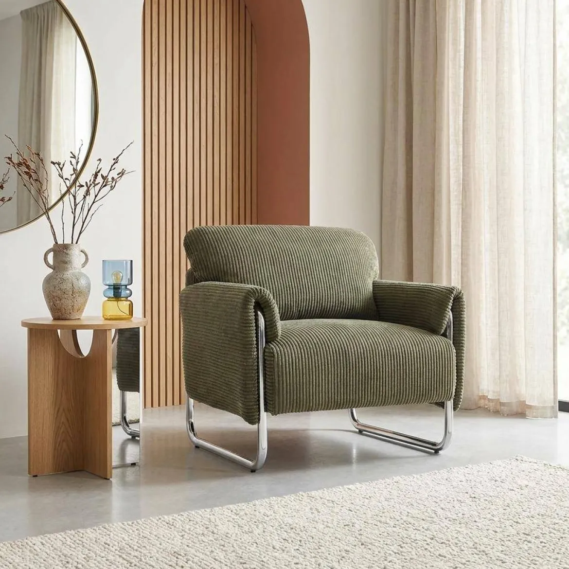 Poltrona vintage in velluto a coste con struttura cromata