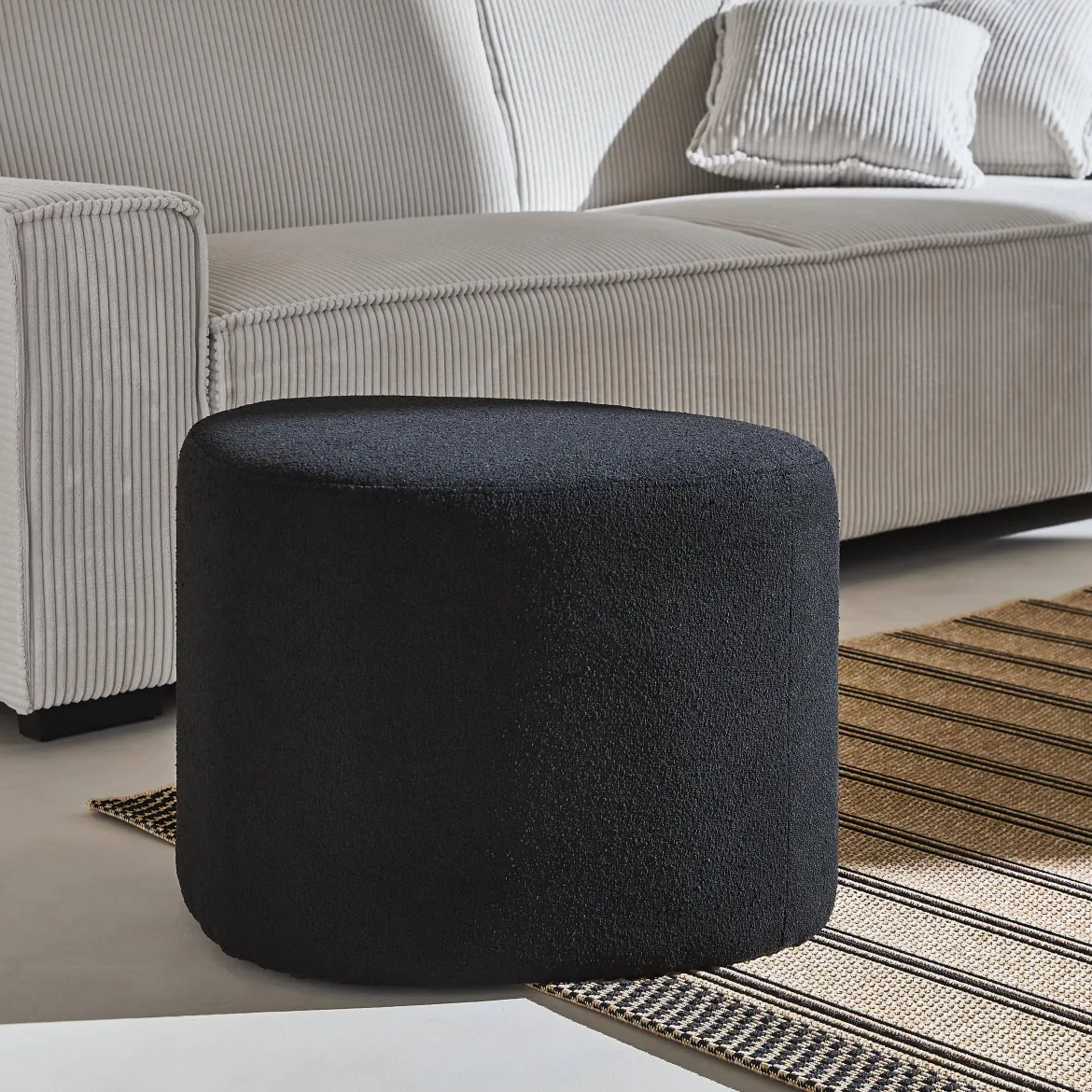 Pouf a forma di ciottolo in tessuto