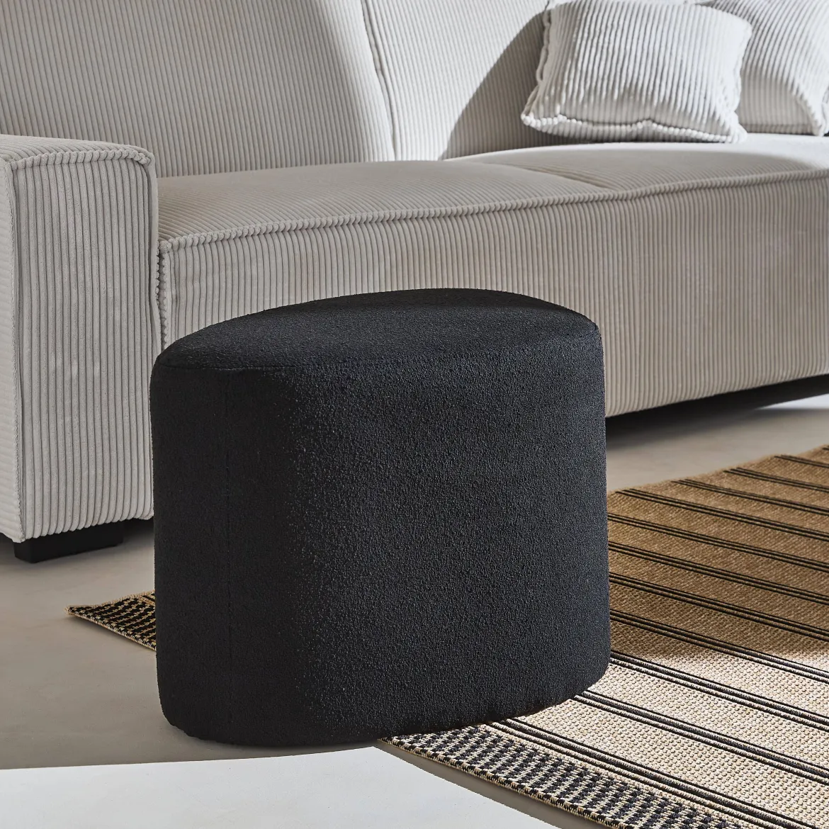 Pouf a forma di ciottolo in tessuto