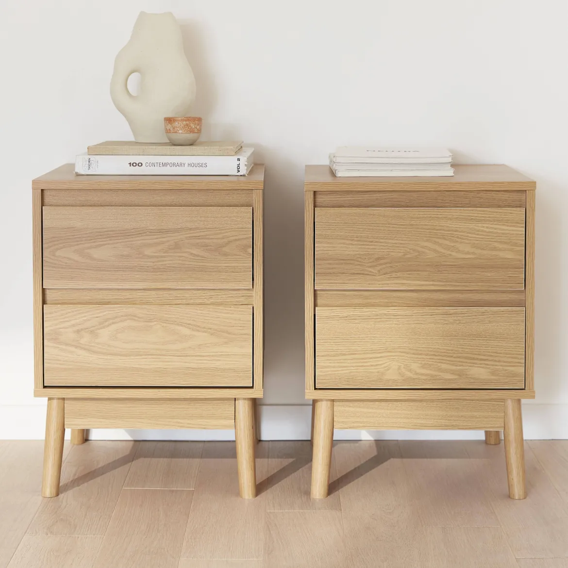 Set 2 comodini effetto legno con due cassetti