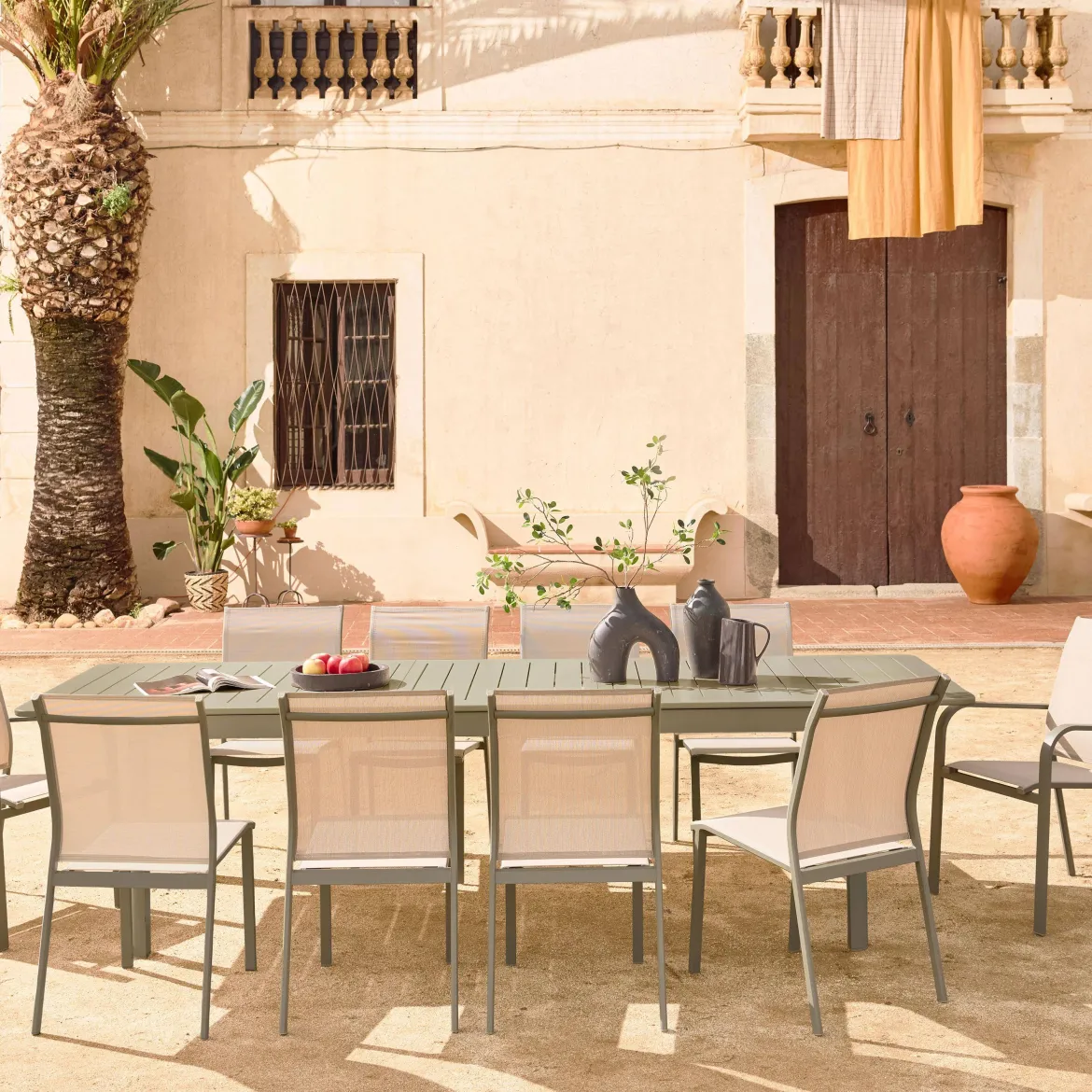 Set tavolo allungabile in alluminio con 10 sedie