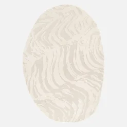 Tappeto interno a forma di ciottolo con rilievo crema