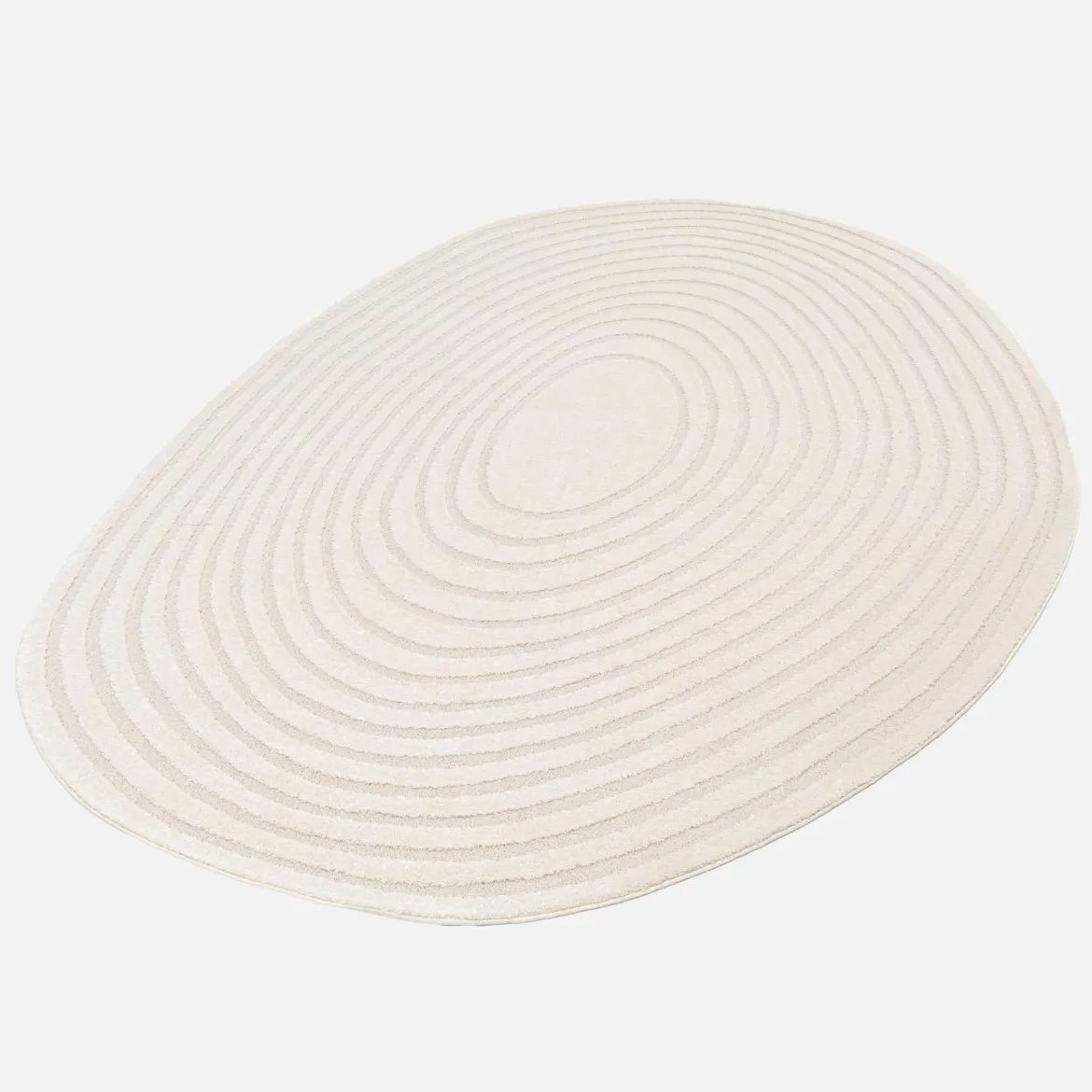 Tappeto interno forma di ciottolo motivo circolare crema