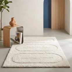Tappeto da interno con motivi geometrici crema